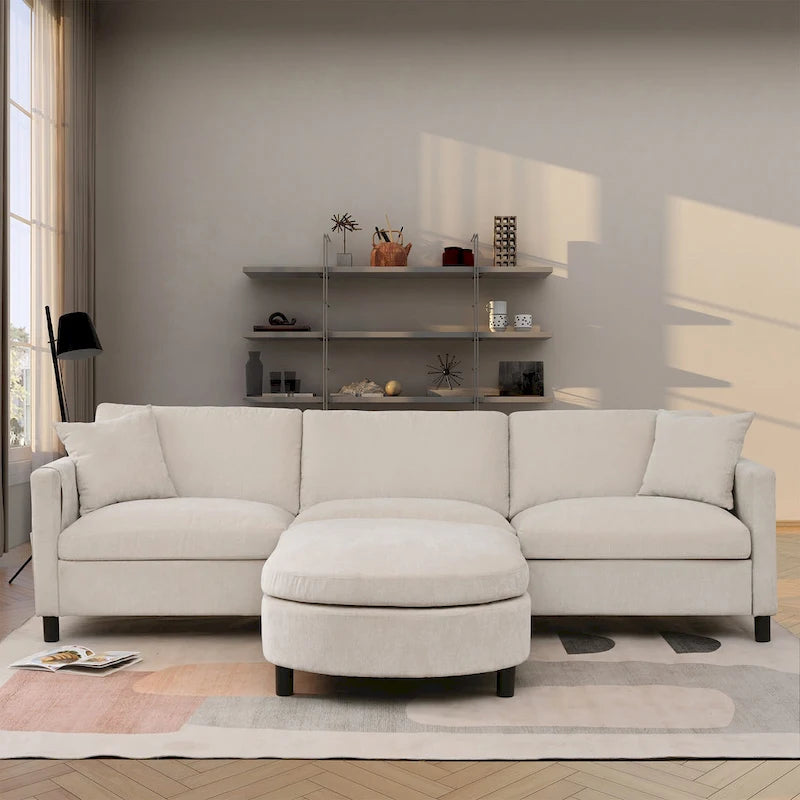 Canapé d'angle en tissu beige avec pouf rond mobile et accoudoir-sac