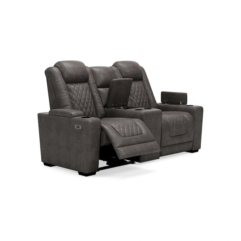Causeuse inclinable électrique grise avec console porte-gobelets en similicuir surpiqué motif diamant