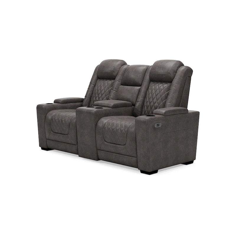 Causeuse inclinable électrique grise avec console porte-gobelets en similicuir surpiqué motif diamant