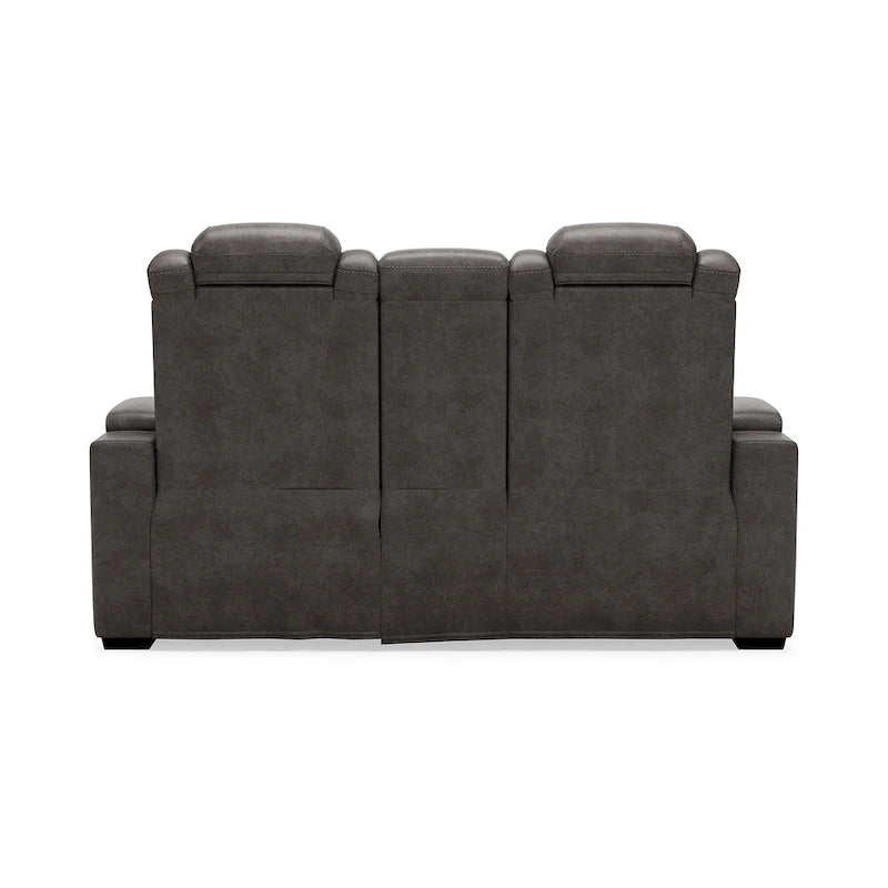Causeuse inclinable électrique grise avec console porte-gobelets en similicuir surpiqué motif diamant