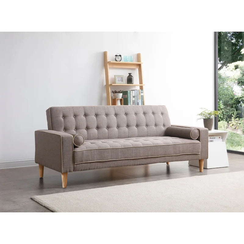 Canapé convertible en tissu capitonné avec pieds en bois et traversins