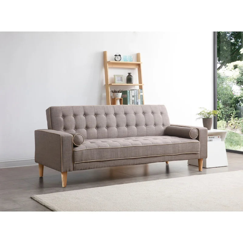 Canapé convertible en tissu capitonné avec pieds en bois et traversins