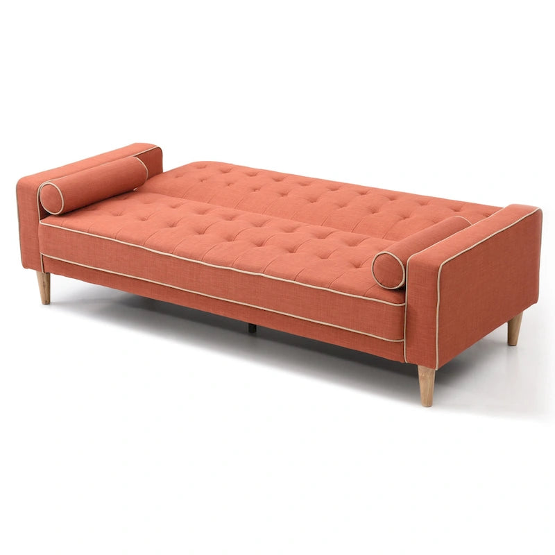 Canapé convertible en tissu capitonné avec pieds en bois et traversins