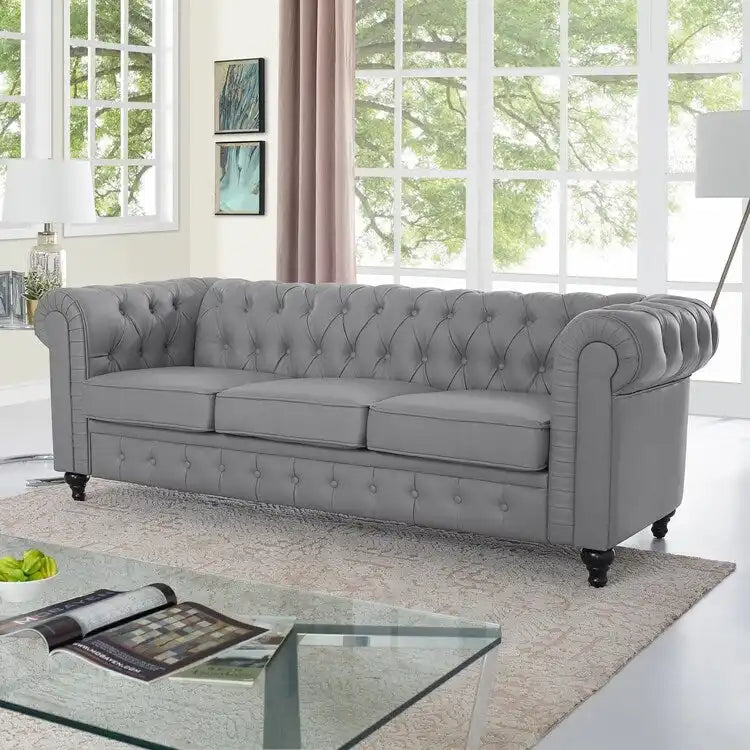 Canapé 3 places gris Chesterfield capitonné à accoudoirs roulés