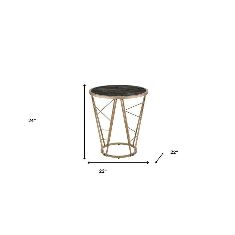 Table d'appoint ronde avec plateau en verre imitation marbre noir et piètement géométrique en métal couleur champagne